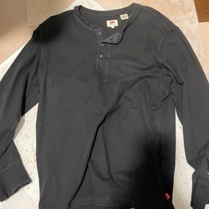 Men’s Levi’s large, slim fit Henley in distressed black.